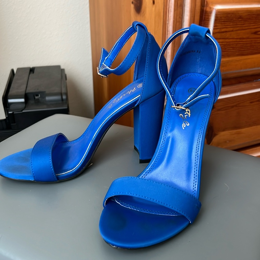 Blue strappy high heels